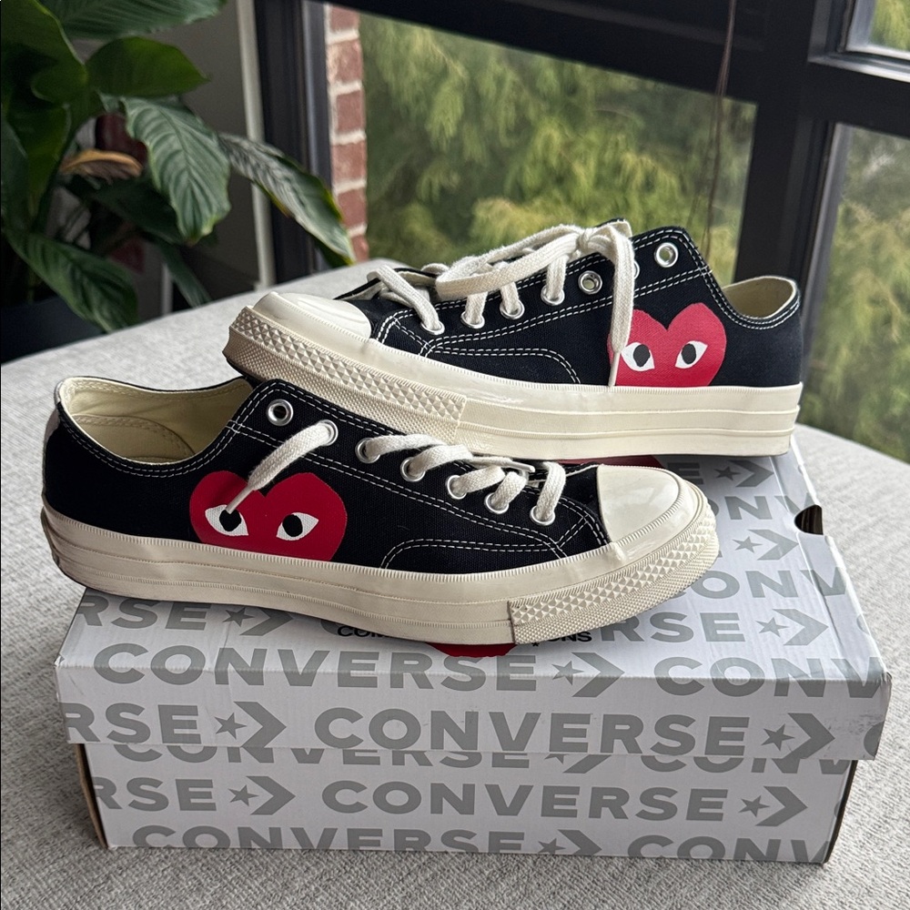 Converse Black and Cream Sneakers with Red Heart
Come Des Garcons